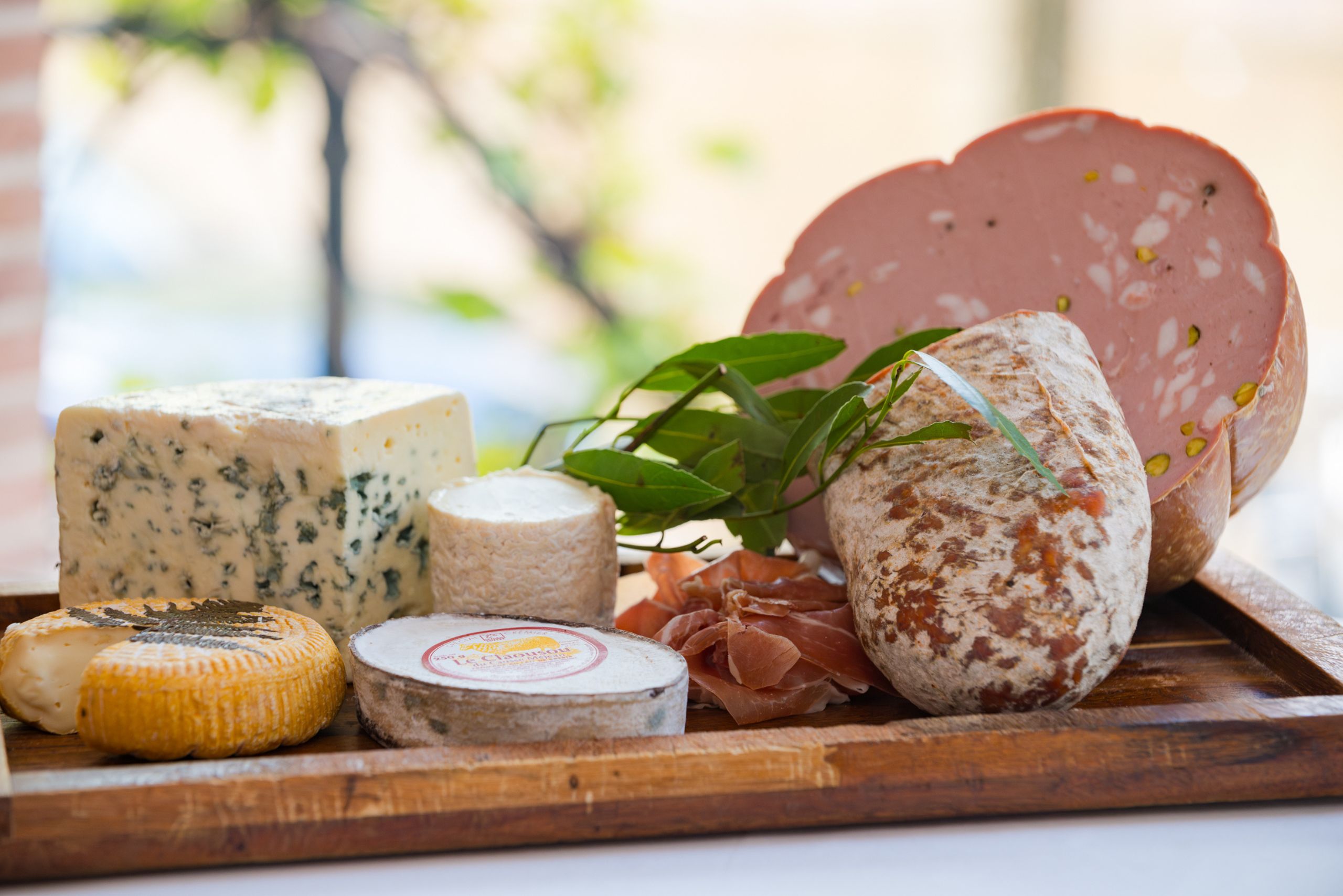 Selection of fresh cheese and charcuterie at Brasserie Ambassade in Amsterdam
