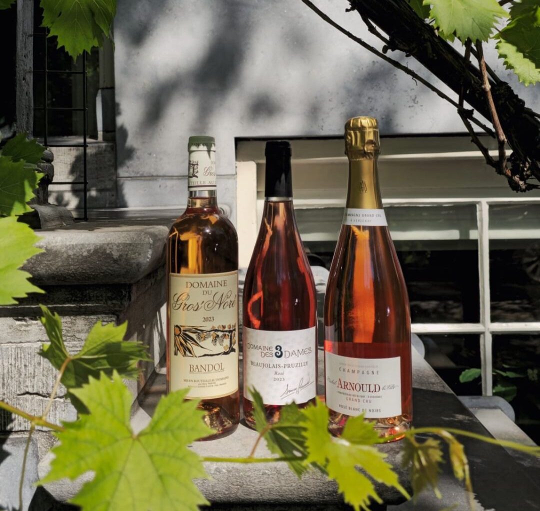 Three bottles of rosé wine displayed at Brasserie Ambassade in Amsterdam