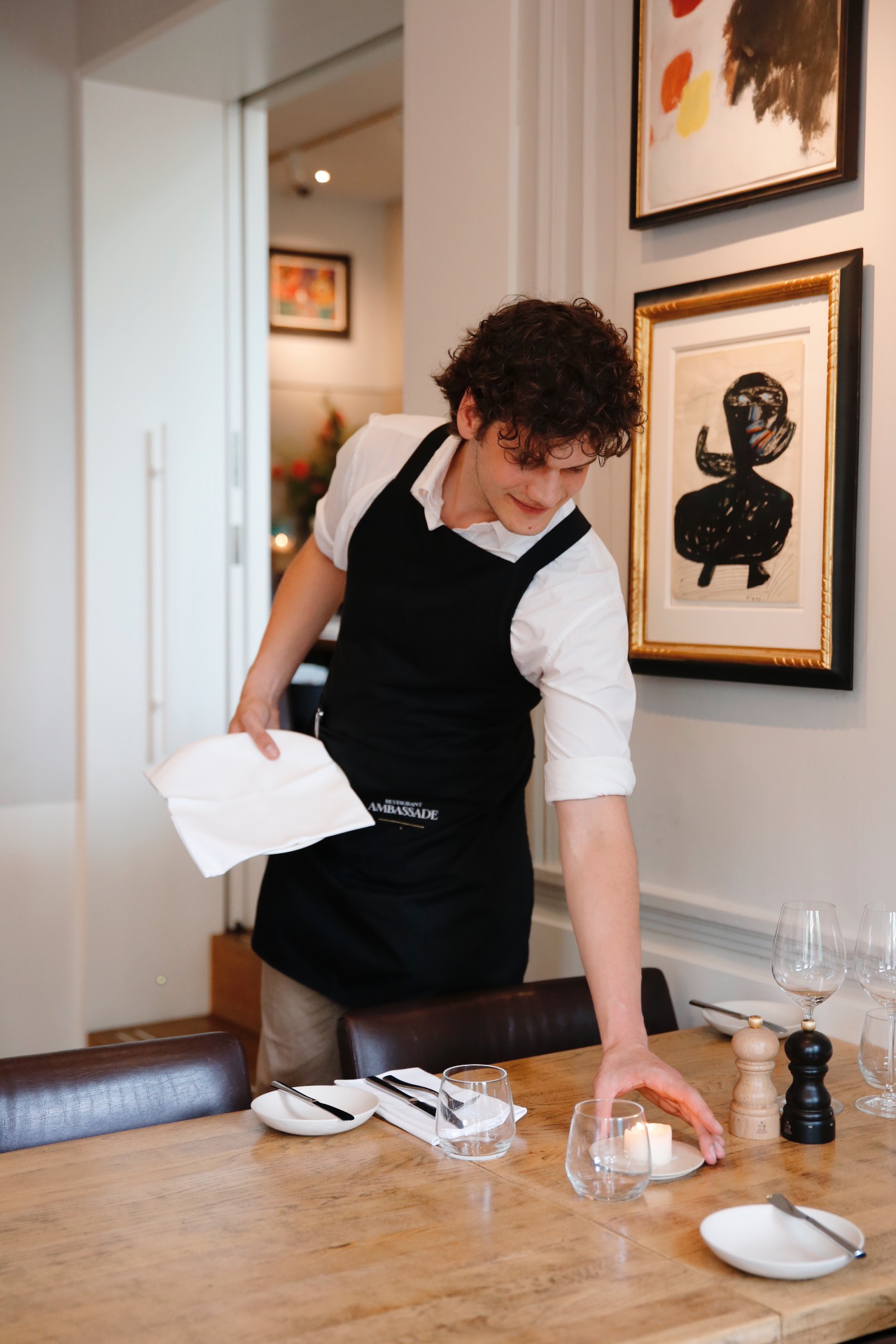 Service staff at work in Brasserie Ambassade in Amsterdam