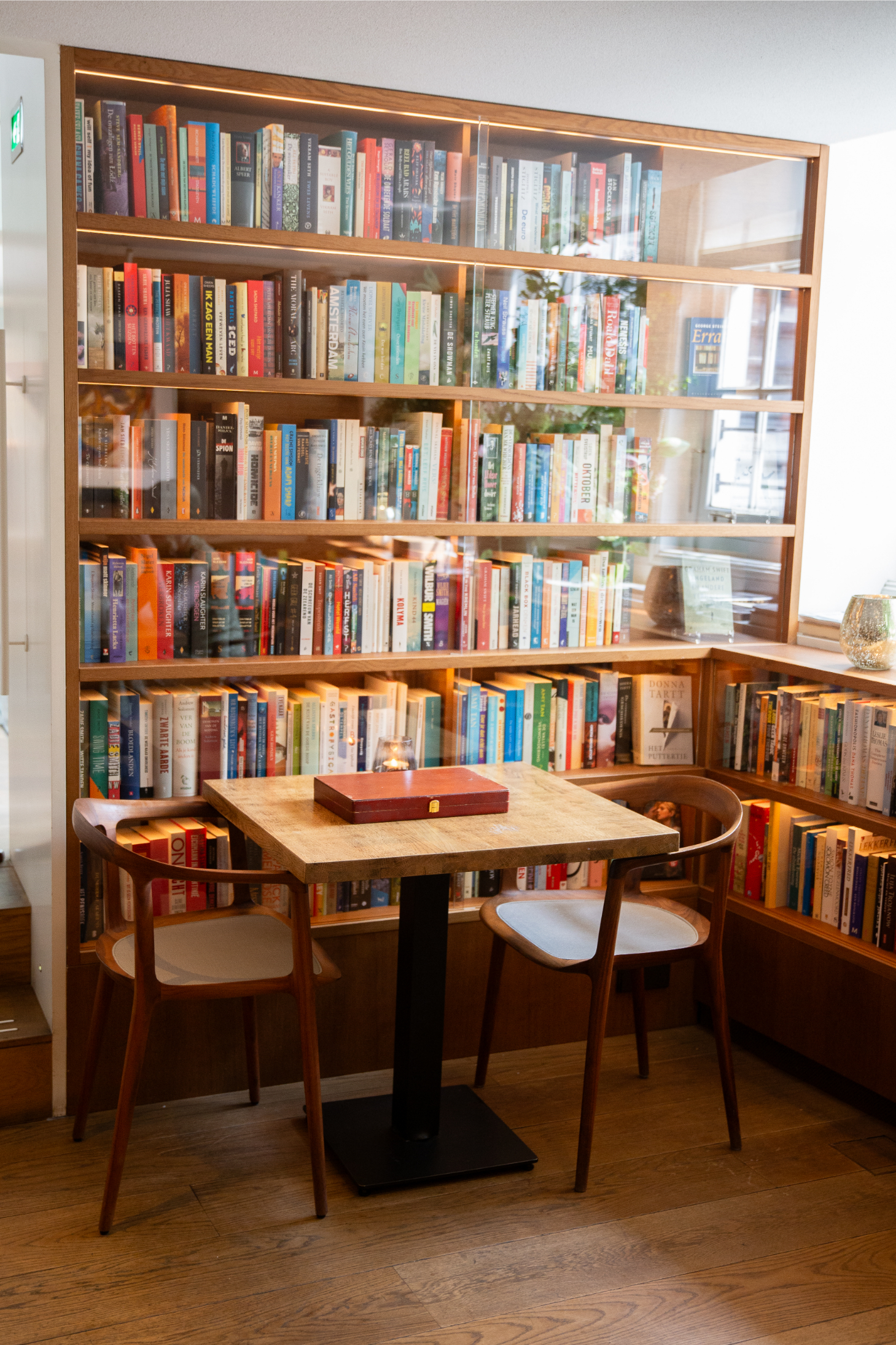 Cozy corner seating area in the Library Bar at the Ambassade Hotel in Amsterdam